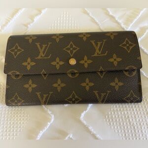 Louis Vuitton Monogram international Wallet in monogram canvas